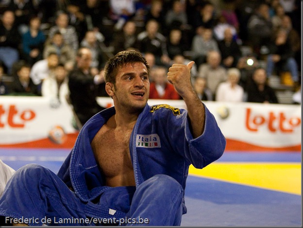 Visé - January 30 : Madda Loni MARCO (blue) from Italy compete with  Guillaume CHAINE from France in the final match of Men's -73 Kg during the Judo Open International 2010 in Visé, Belgium. MARCO won the match.