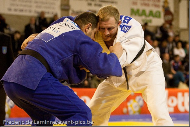 Visé - January 31 : Nedy GIRARD (blue) from France compete with Elco VAN DER GEEST from Belgium in the final round match of Men's -100 Kg during the Judo Open International 2010 in Visé, Belgium. VAN DER GEEST won the match.