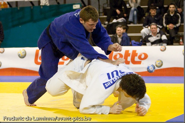 Visé - January 31 : Joachim BOTTIEAU (blue) from Belgium compete with Ciril GROSSKLAUSS from Switzerland in the match for the 3rd place of Men's -81 Kg during the Judo Open International 2010 in Visé, Belgium. BOTTIEAU won the match
