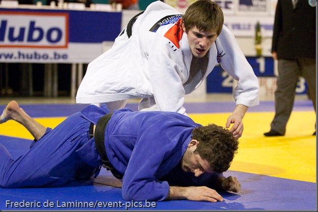 Visé - January 31 : Marco CAUDANA (blue) from Italy compete with Kenneth VAN GANSBEKE from belgium in the match for the 3rd place of Men's -66 Kg during the Judo Open International 2010 in Visé, Belgium. VAN GANSBEKE won the match