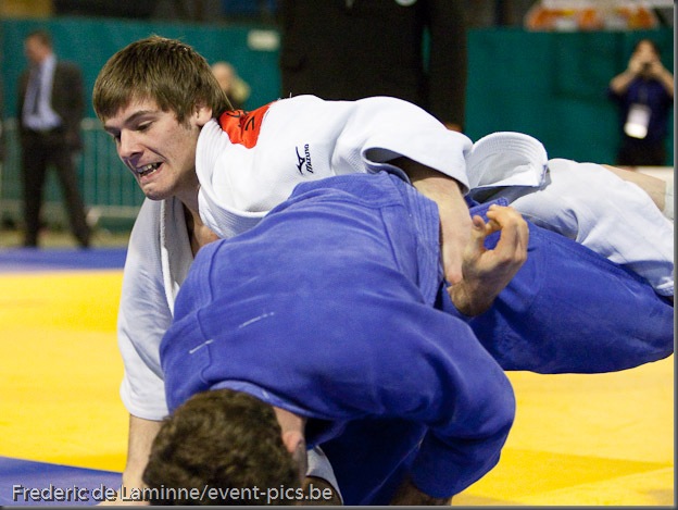 Visé - January 31 : Marco CAUDANA (blue) from Italy compete with Kenneth VAN GANSBEKE from belgium in the match for the 3rd place of Men's -66 Kg during the Judo Open International 2010 in Visé, Belgium. VAN GANSBEKE won the match